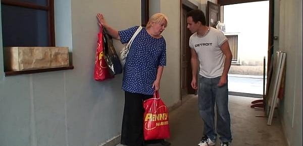  Busty blonde granny pleases an young guy for help